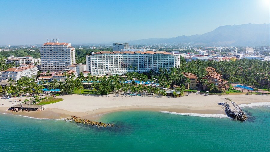 Grand Fiesta Americana Puerto Vallarta adults-only all-inclusive resort with beachfront pools, modern architecture, and scenic ocean views.