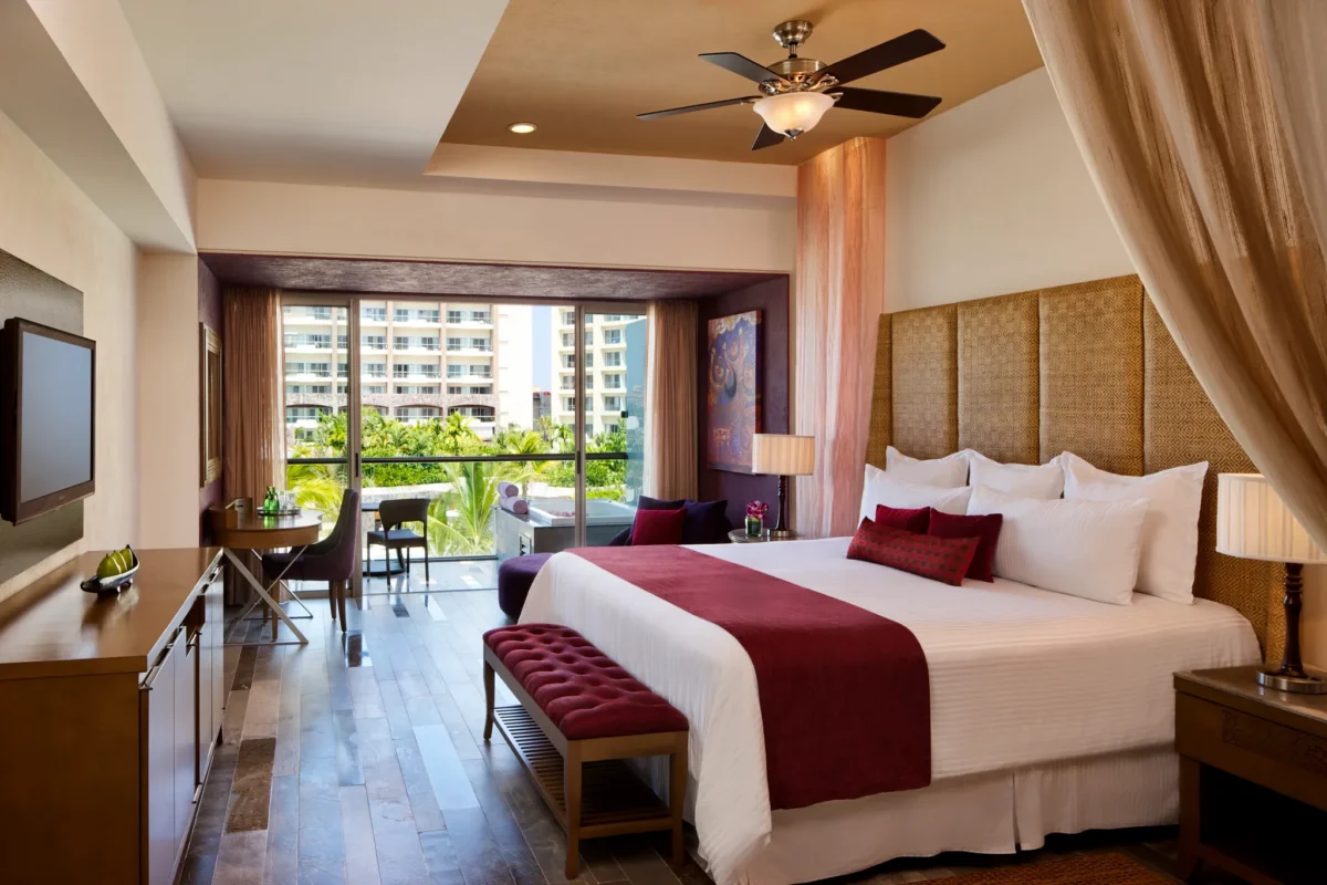 Preferred Club Junior Suite Garden View with king bed and private balcony at Secrets Vallarta Bay Puerto Vallarta.