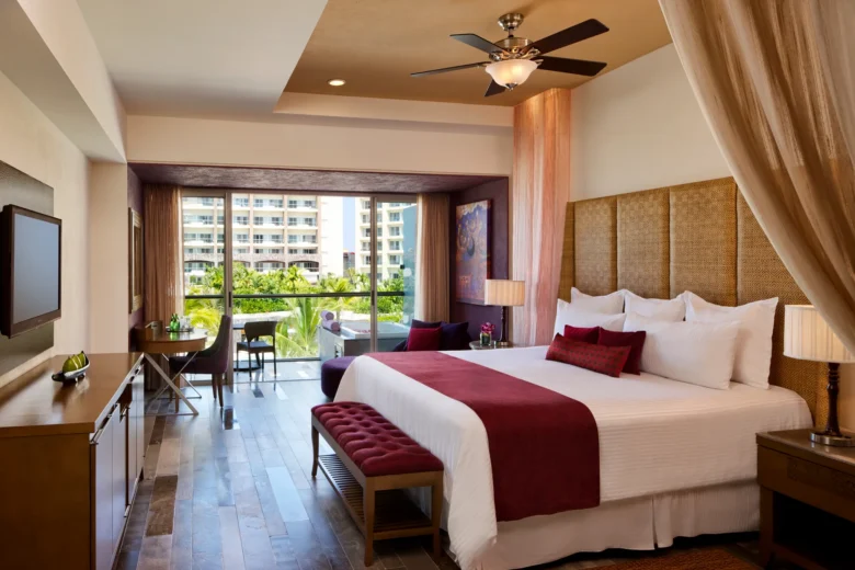Preferred Club Junior Suite Garden View with king bed and private balcony at Secrets Vallarta Bay Puerto Vallarta.