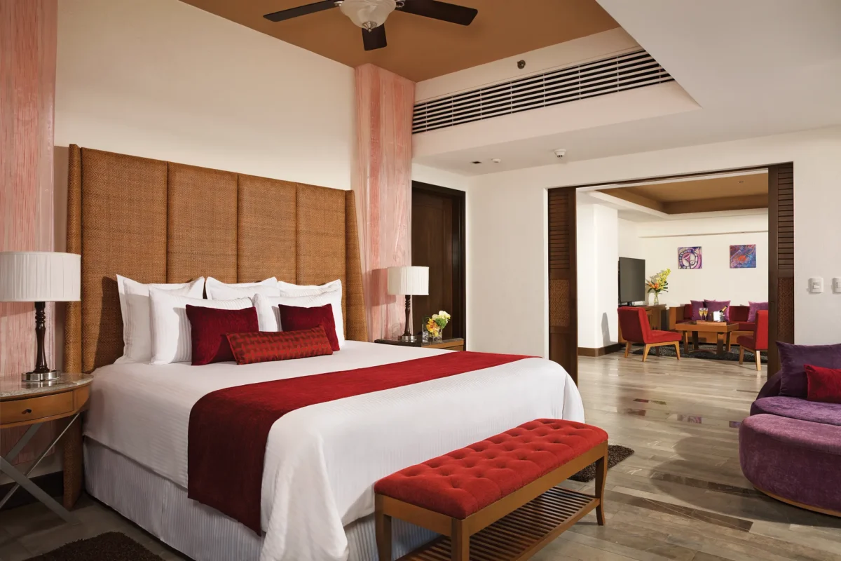 Preferred Club Master Suite Ocean Front Swimout bedroom with king bed and separate living area at Secrets Vallarta Bay Puerto Vallarta.