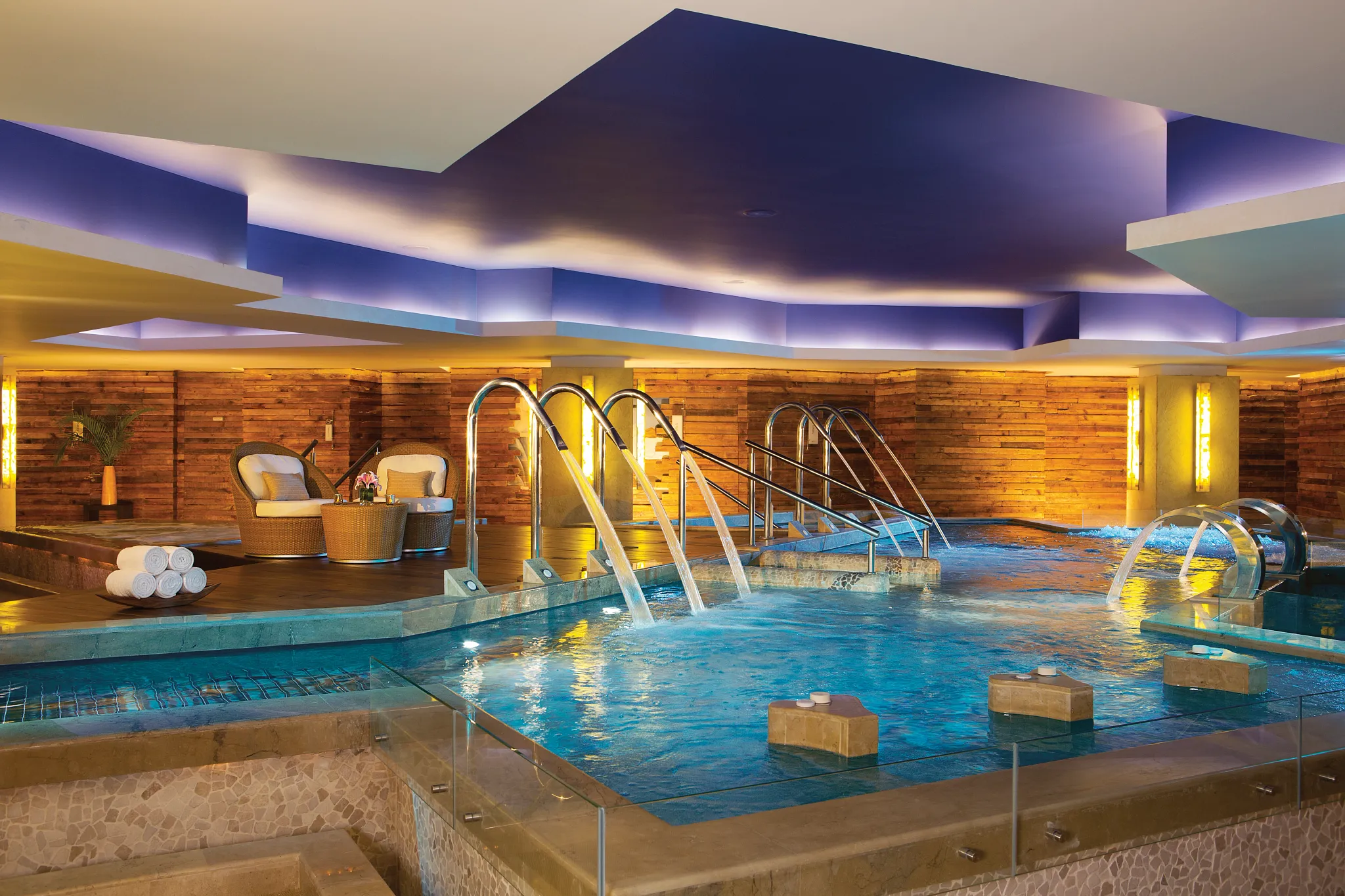 Indoor hydrotherapy pool with water features at Secrets Vallarta Bay Puerto Vallarta spa.