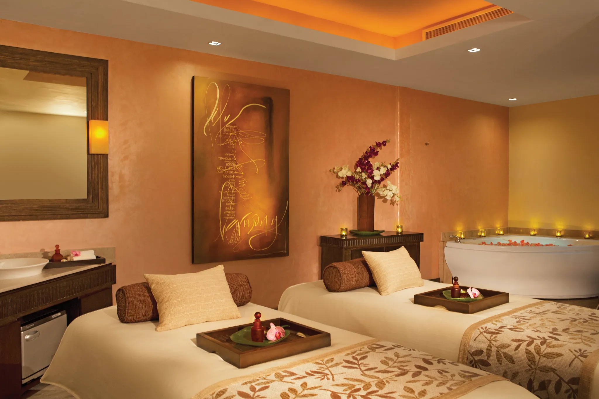 Indoor spa treatment room with massage beds and soothing decor at Secrets Vallarta Bay Puerto Vallarta.
