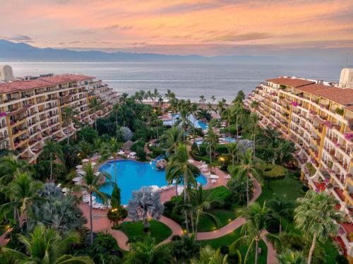 Velas Vallarta Suites Resort family-friendly all-inclusive in Puerto Vallarta Marina with spacious suites, pools, and tropical gardens.